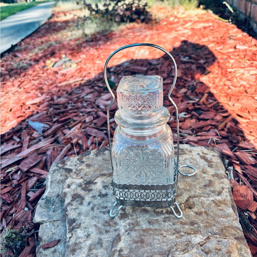 Elegant Clear Glass Decorative Bottle with Silver Basket